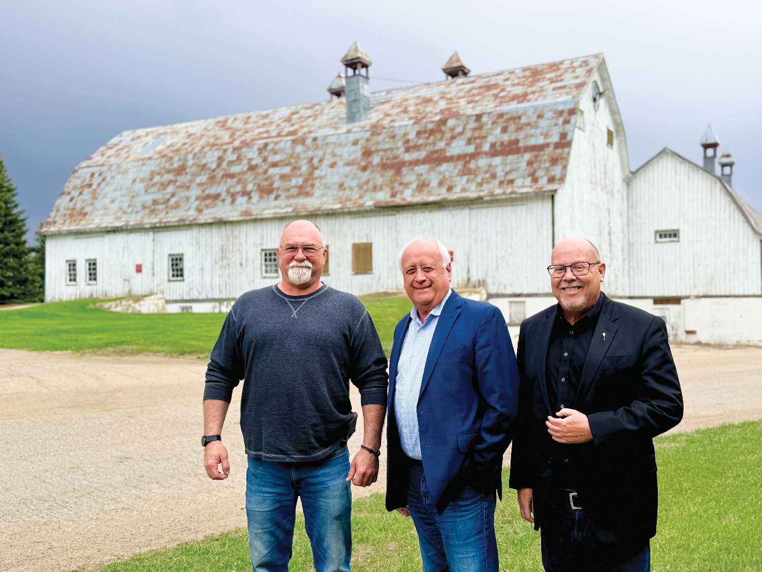 Indian Head Mayor Steven Cole, Saskatchewan Agriculture Minister David Marit and Moosomin-Montmartre MLA Kevin Weedmark at the Indian Head Research Farm.